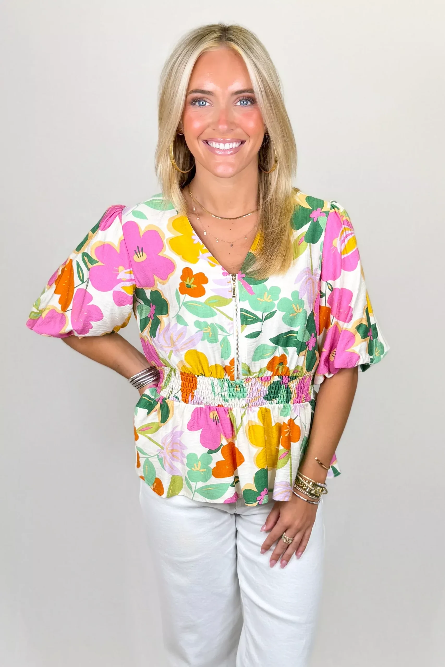 MULTI FLORAL ZIP PEPLUM TOP